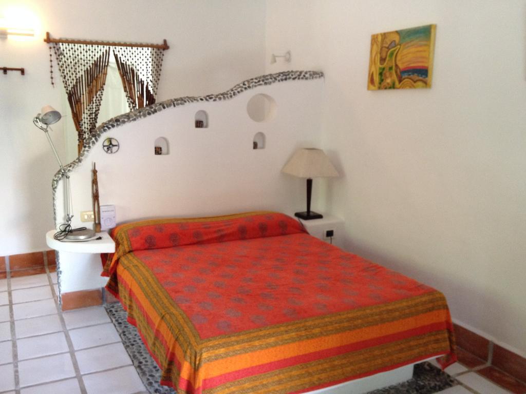 Hotel Que Onda Akumal Pokoj fotografie